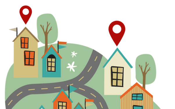 Bunte Häuser auf grünem Hügel mit roten Standortmarkierungen